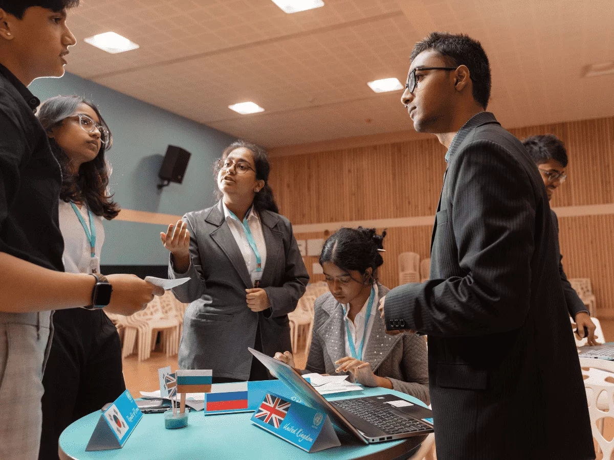 Students discussing ideas in teams during a facilitated session